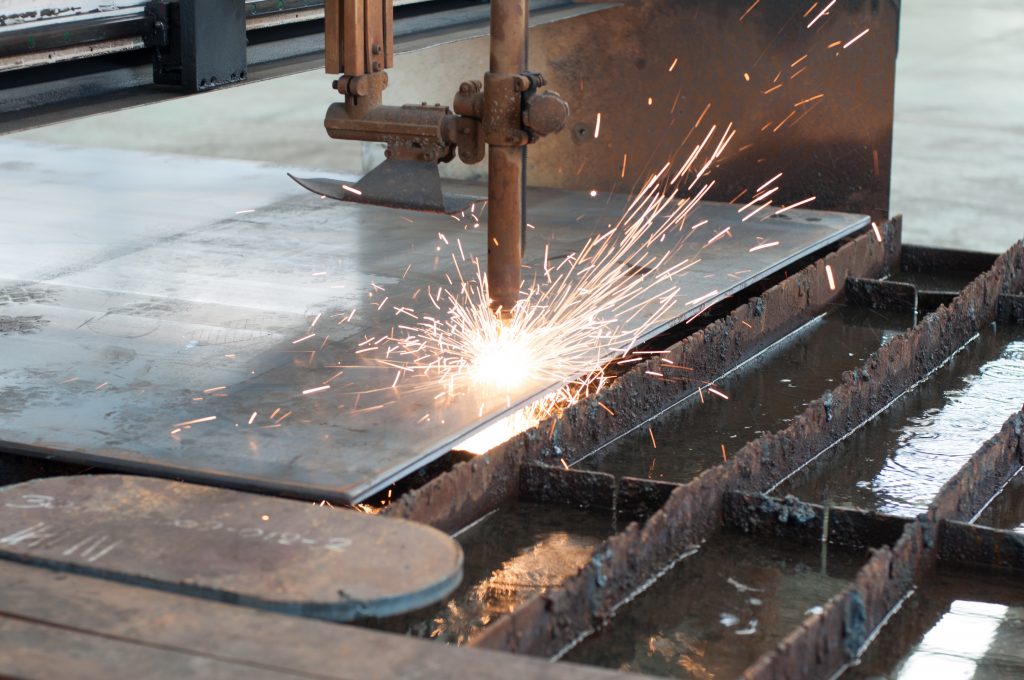 CNC LPG gas cutting on metal plate sparking